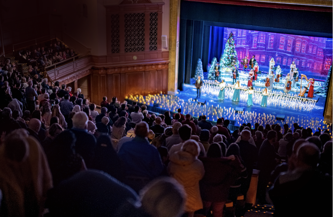 Full audience view of the holiday concert stage